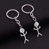 Petit cadeau amusant personnalité dessin animé Couple pendentif en acier inoxydable Graffiti Matchmaker porte-clés