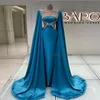 スタイリッシュな青いサウジアラビアアラビア語のイブニングドレス2024ケープスリーブビーズドバイ七面鳥のドレスマーメイド誕生日フォーマルオシップドレスベスティドスデノッシュアバヤシック