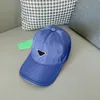 Gorra de béisbol de diseñador Tela Oxford Capa de cabeza Cuero de vaca Moda Hombres y mujeres fuera de la calle Sombreros de moda para las cuatro estaciones con cajas y bolsas de tela