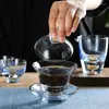 Ensembles de service à thé feuille d'or fait à la main couleur Sancai couvercle bol cristal bord en verre théière tasse ensemble