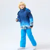 Trench da donna Tuta da sci per bambini Snowboard per bambini Neve calda Abbigliamento da esterno Ragazzo Ragazza Cappotto con cinturino Pantaloni Abbigliamento da sci