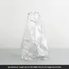 Vaser hem grön transparent oregelbunden bergsformad vas glas vardagsrum kontor dekorativa ornament