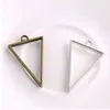 100 Stück Vintage-Stil Bronze-Silber-Legierung Dreieck Charms Hohlkleber Blanko Anhänger Tablett Lünette Charms zur Schmuckherstellung 39x25m245y
