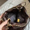 sac à bandoulière design Mini22bag Sac seau à une épaule Sac à dos à bandoulière portable Sac à dos portable Sacs cc designer sac de créateur noir