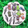 Hurtowe 100pcs Pvc Japan Anime Comic Cartoon Garden Shoe Uroki Dekoracje do zatykania przycisku plecak Gift Wakacyjny