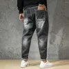 Jeans da uomo moda taglie forti pantaloni jeans casual da uomo strappati pantaloni larghi larghi effetto consumato streetwear hiphop harem