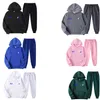 New Tracksuit Men Mulheres Moda Moda de Manga Longa TrackUsits de Hip Hop Calças de Streetwear Masculino Letra de Letra Prind Roupas Executadas 12 Estilos Preto Branco Azul vermelho