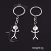 Petit cadeau amusant personnalité dessin animé Couple pendentif en acier inoxydable Graffiti Matchmaker porte-clés