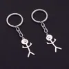 Petit cadeau amusant personnalité dessin animé Couple pendentif en acier inoxydable Graffiti Matchmaker porte-clés