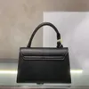 Bolso de diseñador Hobo Bolso vagabundo Bolso de asas Lujos Bolsos de hombro Viajes casuales Tote de negocios Cuero Multifuncional Bolso de asas de moda Bolsos de mujer de lujo Negro MM