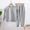 Kleidungssets Junge Mädchen Sweatshirt Frühlings- und Herbstkleidung Junior Kind Mode Jacquard Buchstabe Langarm Top Jogginghose 2-teiliges Set 3-12 Jahre 231019