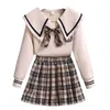 Conjuntos de roupas Coréia Uniforme Escolar Outono Blusa Camisa Com Gravata Borboleta Cintura Alta Saia Plissada 2 PCS Estilo Japonês Estudante JK Outfits 231019