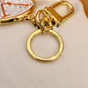 Luxurys Designer Keychain Lover Round Diamond Metal Car Handmade Classic Keychain Men Women Bag Gold Pendant Accessories Gift