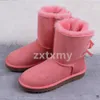 Tasman Pantoufles Australie Bottes de neige classiques ultra mini pour femme - Bottines courtes mi-genou en fourrure australienne - Bottes de neige d'hiver à plateforme rose châtaigne avec nœud papillon