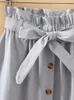 Saias verão outono mulheres midi joelho comprimento coreano elegante botão cintura alta saia feminina plissada escola 231019