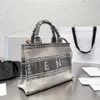 Sell Ce Canvas Tote Bag Womens Designer Bag Gray Luxurys Handbag Ladies Large Capacity Shopping Bags Leisure Totes