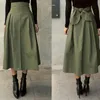 Jupes automne noir femmes mode coréenne couleur unie grande balançoire femme jupe longue sauvage taille haute nœud mince 231019