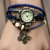 Andra klockor Foreign Trade Antique Watch Fashion Leather Wrapped Armband Epidermis Women Table Farterfly Pendants grossist Barn Tabell 231020