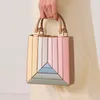 الربط حقيبة قوس قزح Crossbody تصميم جديد ، والشعور المتقدم بالأسلوب الأجنبي والأزياء ، وحقيبة اليدين الكتف Joker Tide.