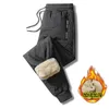 Calças masculinas inverno zip bolsos engrossar velo sweatpants homens corredores preto cinza para baixo algodão quente masculino à prova de água calças térmicas 5xl 231020