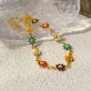 Chaînes en cuivre plaqué or véritable petite marguerite fraîche fleur bracelet collier coloré ins vent contraste design cadeau pour femme