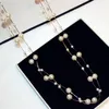 Autumn winter Korean version classic style pearl sweater chain long gold and silver double layer statement necklace woman258w