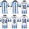 2023 2024 Real Sociedad Fußballtrikots CHO TAKE KUBO OYARZABAL SADIQ ANDRE SILVA ZUBIMENDI BRAIS MENDEZ MERINO LE NORMAND Home Away Herren-Fußballtrikot oben