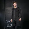 مجموعات الجري Rashguard Men Compression Sportswear مجموعة صالة الألعاب الرياضية الجارية الرياضية للركض الجوارب الجوارب.