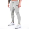 Men's Pants Grey Sports Pants Men's Muscle Fitness Cargo Pants Running Training Gym Bodybuilding Pockets Trousers Black Jogging Pants 231019