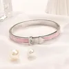 Braccialetti rigidi Bracciale in oro e argento Bambola di lusso europeo e americano rosa Marchio di moda Stili giovani Stile classico Natale272K