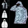 Kamizelki męskie stylowe fluorescencyjne z kapturem mężczyźni wiatraka ciepła jesienna odblaskowa kurtka hip -hopowa płaszcz męski ubranie 231020