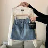 Abiti da lavoro autunno delicato reparto abbigliamento femminile 2023 coreano design cavo camicetta bianca gonna di jeans set da due pezzi