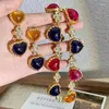 Chaînes colorées cristal coeur vintage collier en métal de luxe élégant automne hiver bijoux cadeau huanzhi 2023 chaîne de pull