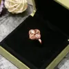 anel de trevo de quatro folhas feito de conchas naturais e ágata natural banhado a ouro 18K para mulheres designer T0P presente de luxo da mais alta qualidade para namorada 003
