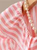 Blouses pour femmes 2023 Femmes Casual Chemise rayée à volants plissée col rond simple boutonnage dames doux sans manches et haut