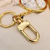 Luxurys Designer Keychain Lover Round Diamond Metal Car Handmade Classic Keychain Men Women Bag Gold Pendant Accessories Gift