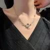 Collane con ciondolo Collana a forma di cuore scavata Collana da donna in metallo stile coreano Girocolli di perle vintage Personalità asimmetrica Accessori da ballo