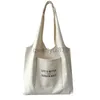 Sacos de ombro 2023 saco de compras saco de texto padrão impressão bege reutilizável simples grande capacidade moda tote bagqwertyui879