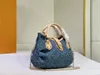 Denim Vintage Sacs à bandoulière Femmes Fourre-tout Sacs à main en toile Vieille fleur sous les bras Sac à main imprimé Sac à dos Or Matériel Pochette M44473