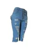 Pantaloncini di jeans a vita alta strappati blu alla moda