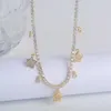 Collane con ciondolo Collana da donna in oro 14 carati di alta qualità Moda Luna e stella Zircone per gioielli da festa di nozze per ragazza lunghi 45 cm