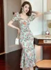 Robes de base décontractées Summer Summer Français Robe longue pour les femmes Rose Print Fleurs élastiques Fleurs de bulle enveloppe Hip Fishtail Robe Femme Party Vestido 2024