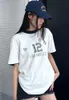 24SS Abings Women Fashion Designer T-shirt Ny bomullsvintage tryckmönster strand tee avslappnad mångsidig klassisk stil lös kortärmad polos tshirt trend