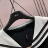 Miumius Designer Fashion Women Source Standard högre version Navy Collar Sweater Cardigan Coat Lazy Knit French och liten topp