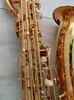 Saxofón barítono profesional dorado, mejora de sintonización electrónica plana, patrón de grabado profundo de doble costilla, instrumento de jazz de tono de alta calidad