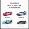 2,4G1 58 Mini Cola kann RC Fernbedienung Radio Micro Racing Car LED Light Appphone Sensor Multiplayer -Modus zusammen Fahrzeugspielzeug 231227
