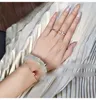 Japonya ve Güney Kore Basitlik CNC Desinger Tiff Ring Kadın Moda Titanyum Steel -Placated Gül Altın Çiftler Toptan