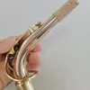 Tube de bouche de saxophone alto en or rose haut de gamme, en bronze phosphoreux, ton du cou plié à travers des accessoires transparents et lumineux