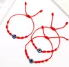 Bracelets de charme 12pcs / lots Bracelet tressé Evil's Eye Corde en nylon rouge Chanceux Amitié Femmes Hommes Ensemble