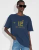 24SS Abings Women Fashion Designer T-shirt Ny bomullsvintage tryckmönster strand tee avslappnad mångsidig klassisk stil lös kortärmad polos tshirt trend